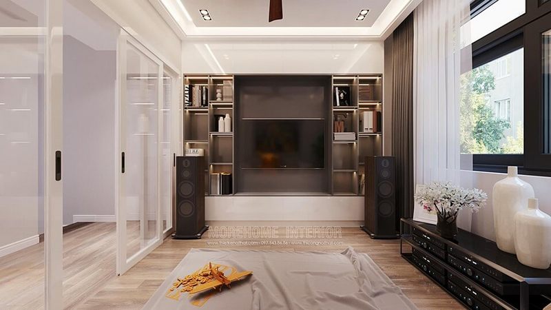 Trang trí nội thất phòng sinh hoạt chung tại khu vực hành lang tầng nhà biệt thự đẹp với hệ tủ gỗ liền kệ tivi hiện đại màu trắng gỗ công nghiệp an cường